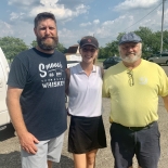 three people smiling for photo